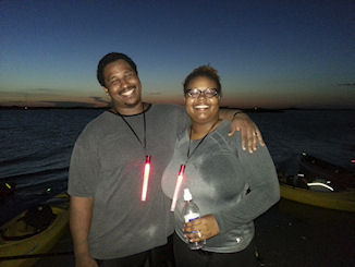 photo of couple on fireworks paddle to Big Island